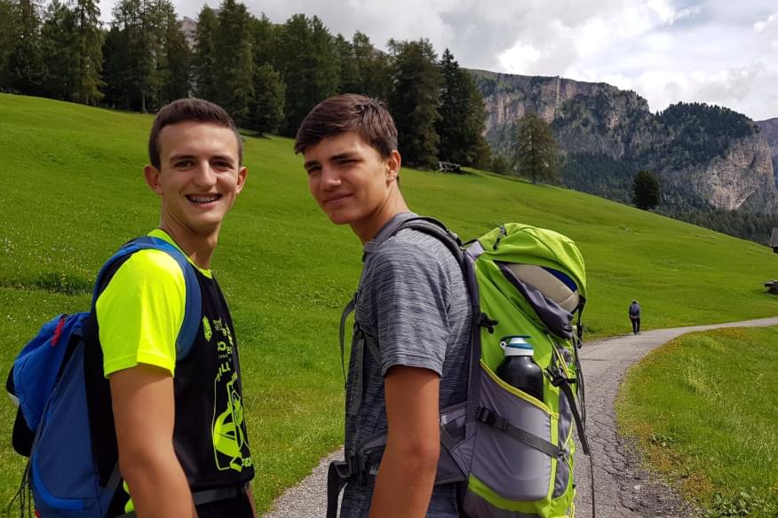 Young ignatian boys on a mountain path