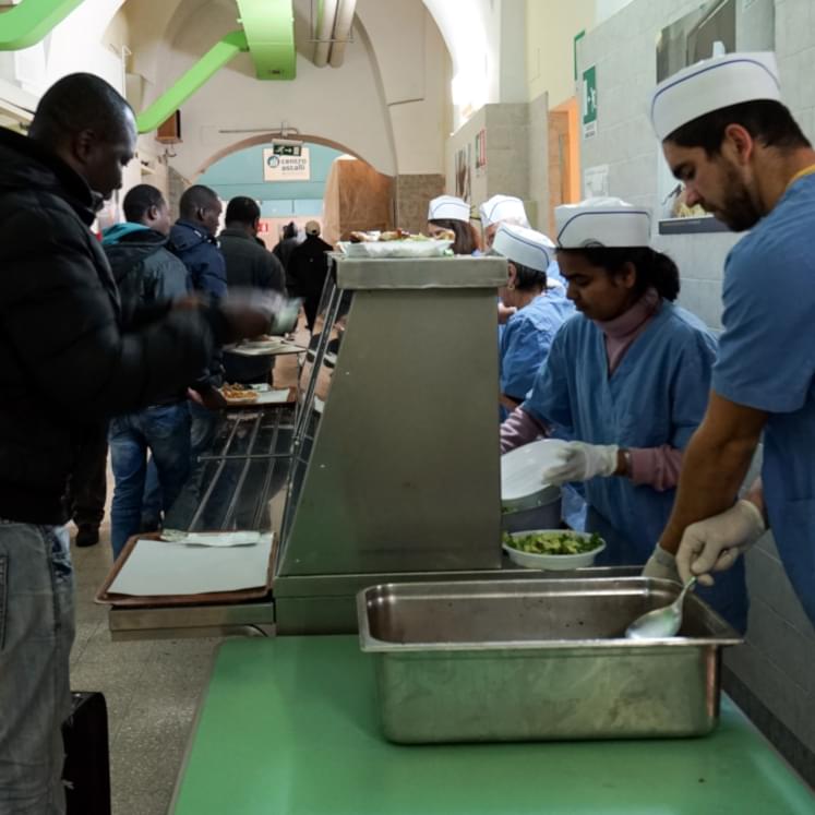 Distribution of meals at the canteen of the Jesuit Refugee Service, Centro Astalli