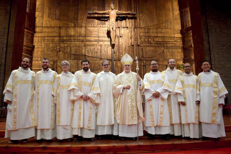 a Jesuit walking with Leonardo and Cristiano, recently